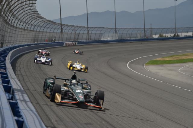 Ed Carpenter leads a group exiting Turn 4 during the MAVTV 500 at Auto Club Speedway -- Photo by: Chris Owens