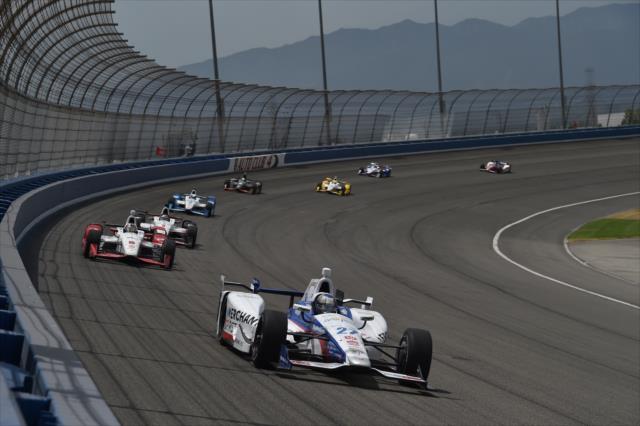 Marco Andretti leads a group of cars through Turn 4 during the MAVTV 500 at Auto Club Speedway -- Photo by: Chris Owens