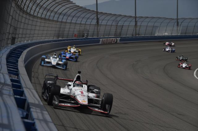 Will Power leads a group exiting Turn 4 during the MAVTV 500 at Auto Club Speedway -- Photo by: Chris Owens