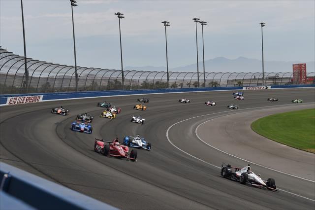 Will Power and Graham Rahal lead the field through Turn 2 during the MAVTV 500 at Auto Club Speedway -- Photo by: Chris Owens