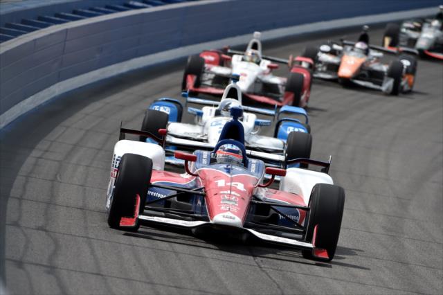 Takuma Sato leads the field exiting Turn 4 during the MAVTV 500 at Auto Club Speedway -- Photo by: Chris Owens