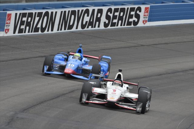 Will Power and Tony Kanaan set up for Turn 3 during the MAVTV 500 at Auto Club Speedway -- Photo by: Chris Owens