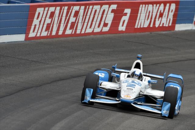 Juan Pablo Montoya sets up for Turn 2 during the MAVTV 500 at Auto Club Speedway -- Photo by: Chris Owens