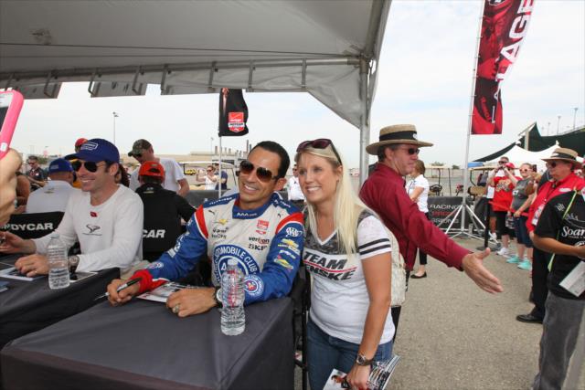 Helio Castroneves poses for a photo during the autograph session in the INDYCAR Fan Village at Auto Club Speedway -- Photo by: Richard Dowdy