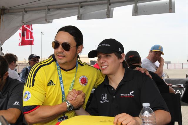 Gabby Chaves poses for a photograph during the autograph session in the INDYCAR Fan Village at Auto Club Speedway -- Photo by: Richard Dowdy