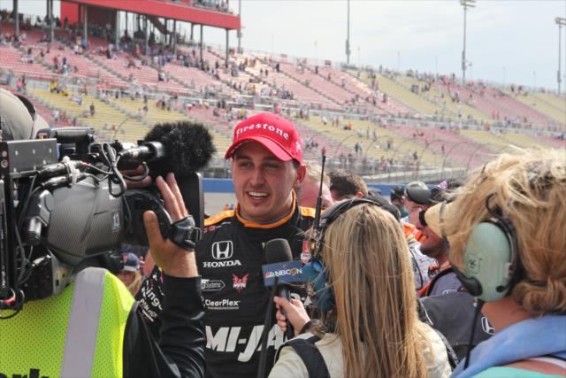 Graham Rahal is interviewed in Victory Lane after winning the MAVTV 500 at Auto Club Speedway -- Photo by: Richard Dowdy