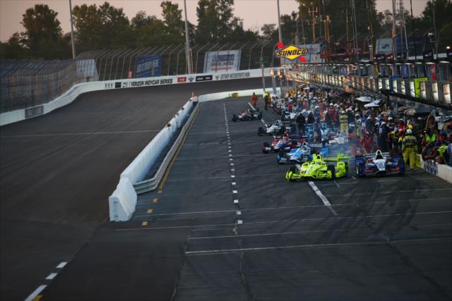 Simon Pagenaud leads a group out of pit lane during the pit stop competition prior to the Bommarito Automotive Group 500 at Gateway Motorsports Park -- Photo by: Bret Kelley