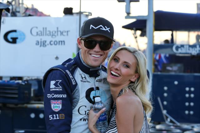 Max Chilton and his wife, Chloe, on pit lane prior to the start of the Bommarito Automotive Group 500 at Gateway Motorsports Park -- Photo by: Chris Jones