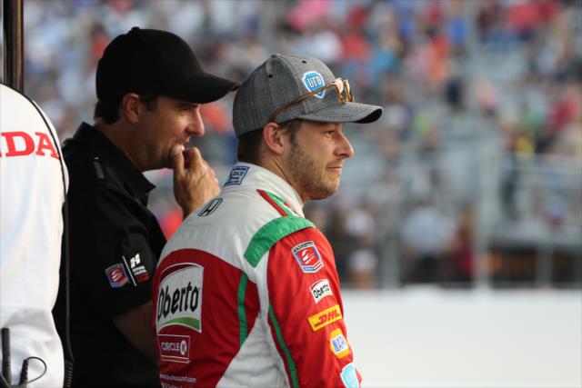 Marco Andretti with team owner Bryan Herta watch the pit stop competition prior to the start of the Bommarito Automotive Group 500 at Gateway Motorsports Park -- Photo by: Chris Jones
