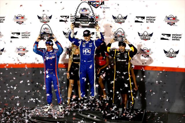 The confetti flies as Josef Newgarden, Scott Dixon, and Simon Pagenaud hoist their trophies following the Bommarito Automotive Group 500 at Gateway Motorsports Park -- Photo by: Bret Kelley