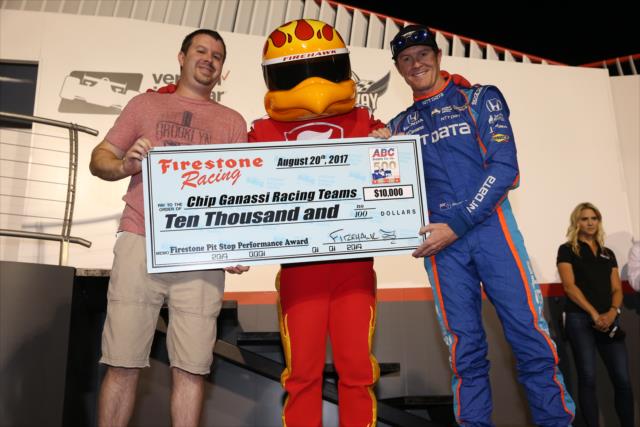 Scott Dixon accepts the Firestone Pit Stop Performance Award on behalf of Chip Ganassi Racing for their performance at Pocono Raceway -- Photo by: Chris Jones