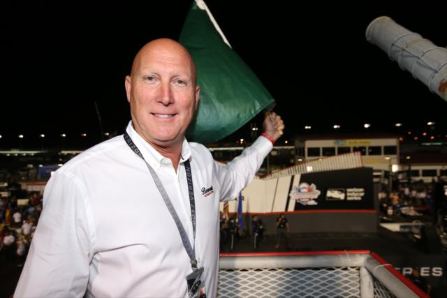 Chuck Wallis, Vice President & General Manager, Bommarito Automotive Group ready to waive the green flag to start the Bommarito Automotive Group 500 at Gateway Motorsports Park -- Photo by: Chris Jones