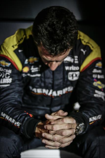 Simon Pagenaud with a quiet moment backstage during pre-race introductions for the Bommarito Automotive Group 500 at Gateway Motorsports Park -- Photo by: Shawn Gritzmacher