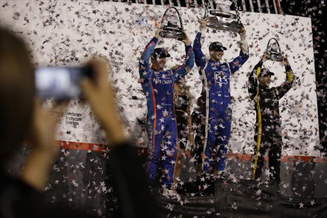 The confetti flies over Josef Newgarden, Scott Dixon, and Simon Pagenaud on Victory Stage following the Bommarito Automotive Group 500 at Gateway Motorsports Park -- Photo by: Shawn Gritzmacher