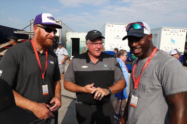 Harding Racing team president Brian Barnhart gives former St. Louis Rams players Andy McCollum and Will Witherspoon a tour at Gateway Motorsports Park -- Photo by: Chris Jones