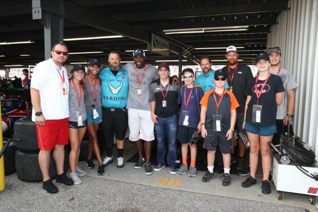 Former St. Louis Rams players Will Witherspoon and Andy McCollum with Gabby Chaves in the Harding Racing garage at Gateway Motorsports Park -- Photo by: Chris Jones