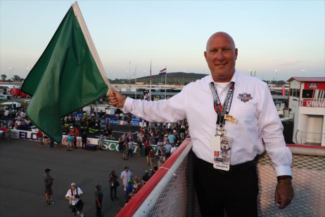 Honorary Starter Chuck Wallis ready to fly the green flag to start the Bommarito Automotive Group 500 at Gateway Motorsports Park -- Photo by: Chris Jones