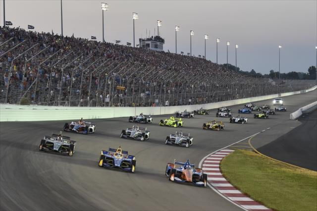 The field rolls into Turn 1 in rows of three to salute the fans prior to the start of the Bommarito Automotive Group 500 at Gateway Motorsports Park -- Photo by: Chris Owens