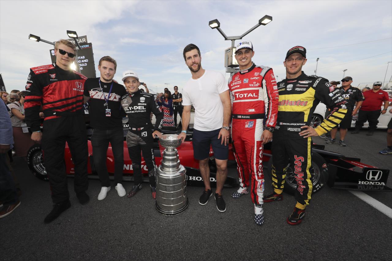 St. Louis Blues players Colton Parayko, Alex Pietrangelo and Ivan Barbashev with Santino Ferrucci, Graham Rahal, Sebastien Bourdais and the Stanley Cup -- Photo by: Chris Owens