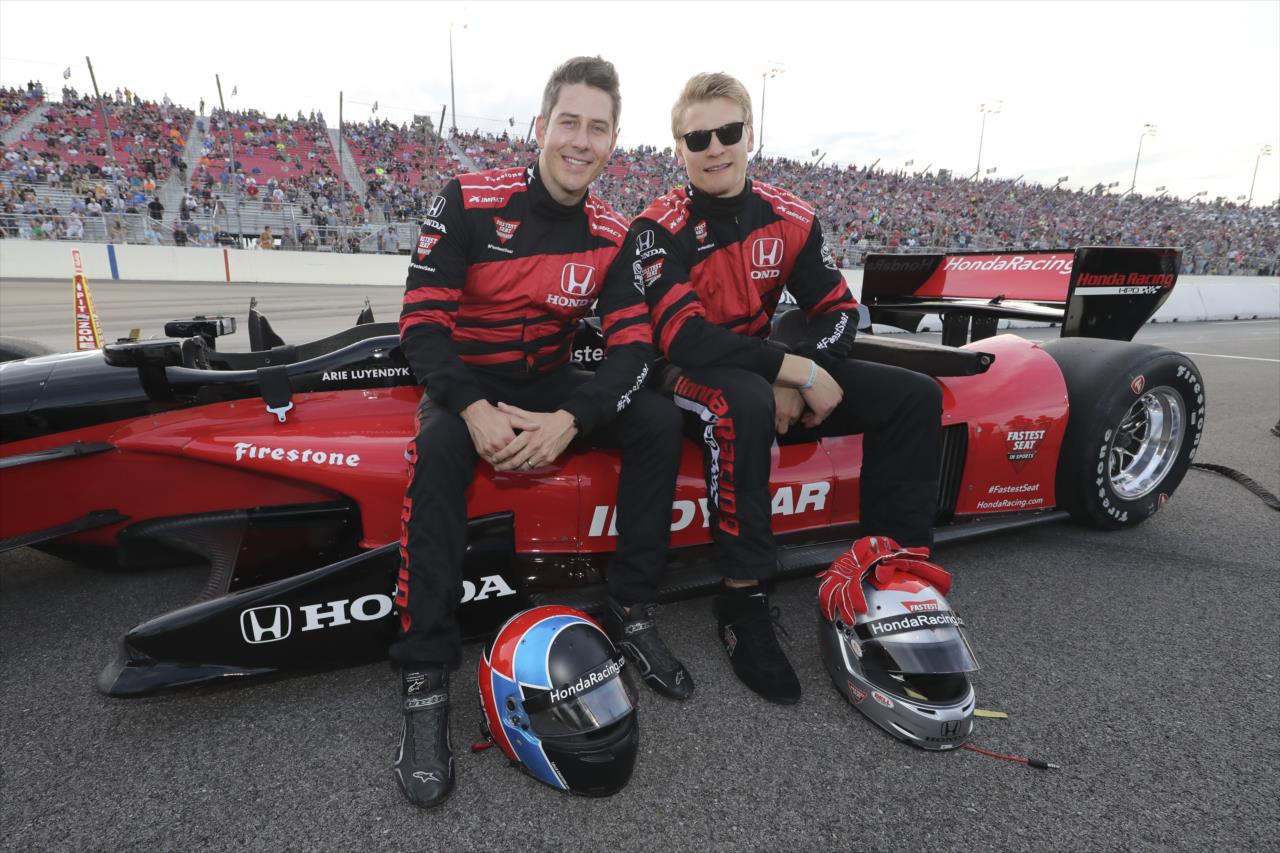 Honda Fastest Seat in Sports two-seater driver Arie Luyendyk Jr. with rider and St. Louis Blues player Colton Parayko -- Photo by: Chris Owens