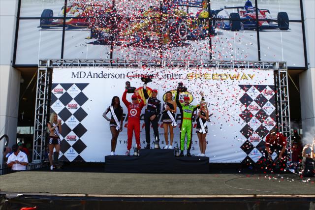The confetti flies as the podium raise their trophies after Race 2 of the Shell and Pennzoil Grand Prix of Houston -- Photo by: Bret Kelley