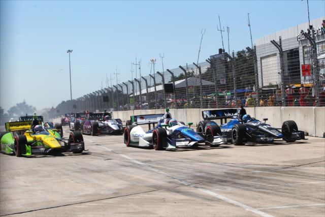 Tristan Vautier, Simona De Silvestro, and Graham Rahal go three-wide into Turn 1 during Race 2 of the Shell and Pennzoil Grand Prix of Houston -- Photo by: Chris Jones