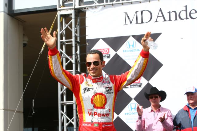 Helio Castroneves is introduced to the fans in Houston during pre-race seremonies -- Photo by: Chris Jones