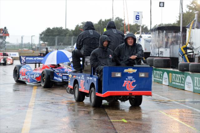 The car of Marco Andretti it towed out of pit lane -- Photo by: Chris Owens