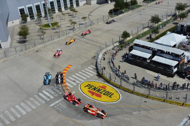 Helio Castroneves leads the field through Turn 4 during the early stages of Race 2 of the Shell and Pennzoil Grand Prix of Houston -- Photo by: John Cote