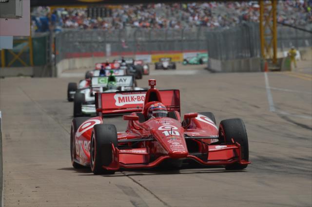 Tony Kanaan leads a pack of cars in Race 2. -- Photo by: Chris Owens