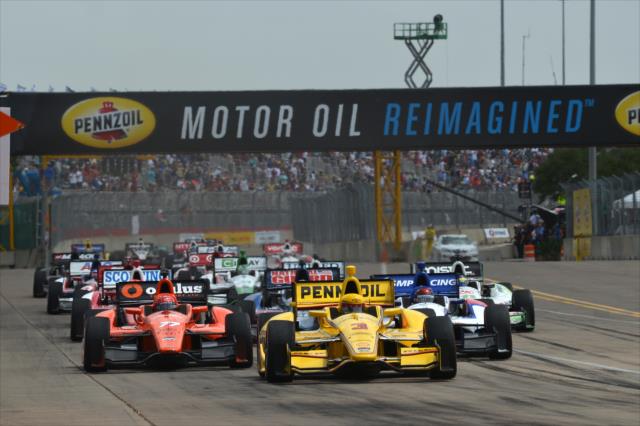 Helio Castroneves leads the field at the start of Race 2. -- Photo by: Chris Owens
