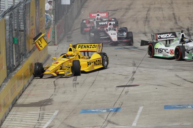 Helio Castroneves makes contact in Race 2. -- Photo by: Joe Skibinski