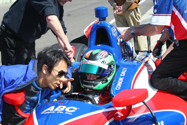 Takuma Sato and Conor Daly chat before practice -- Photo by: Chris Jones