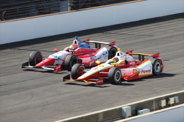 Justin Wilson and Helio Castroneves -- Photo by: Leigh Spargur