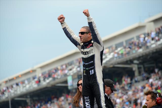 Tony Kanaan turns to the fans after his win -- Photo by: Chris Owens