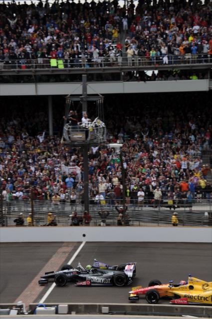 Tony Kanaan crosses the bricks to win his first Indy 500 -- Photo by: Eric McCombs