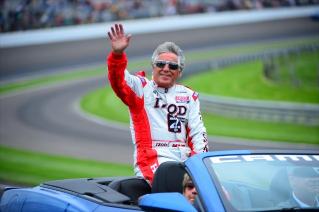 Mario Andretti waves to the crowd -- Photo by: Michael Roth