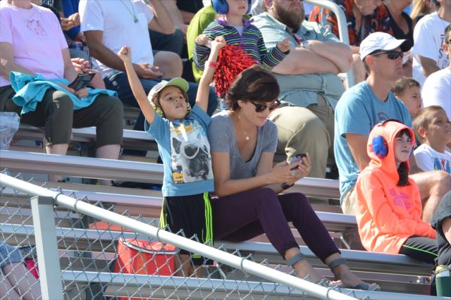 A young fan cheers on the action at the Milwaukee Mile -- Photo by: Chris Owens