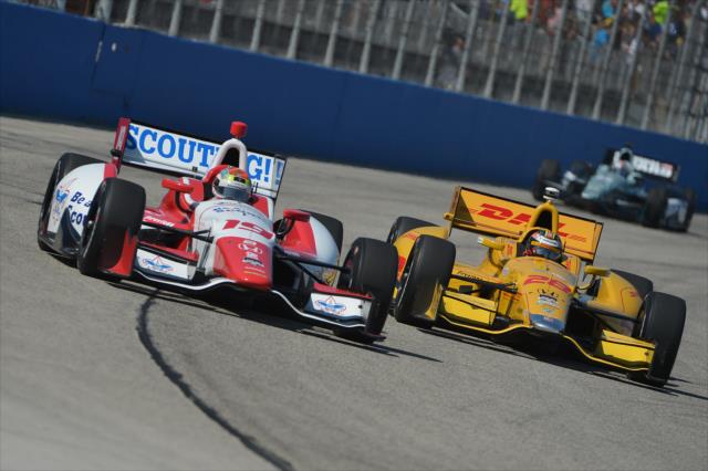 Justin Wilson and Ryan Hunter-Reay barrel into Turn 1 during the ABC Supply Wisconsin 250 at the Milwaukee Mile -- Photo by: Chris Owens