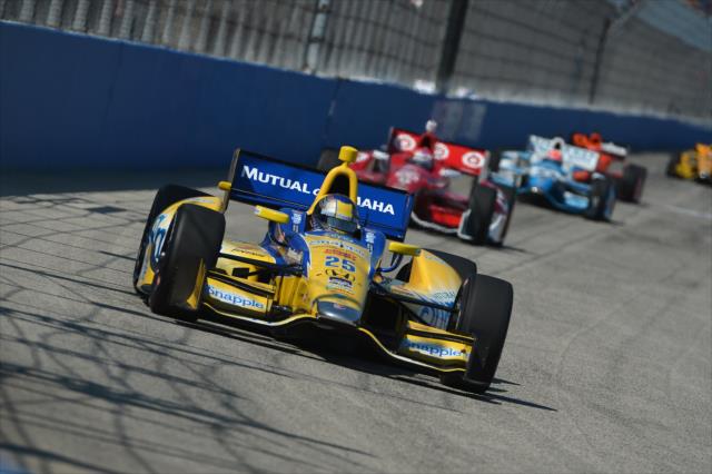Marco Andretti leads a group of cars into Turn 1 during the ABC Supply Wisconsin 250 at the Milwaukee Mile -- Photo by: Chris Owens