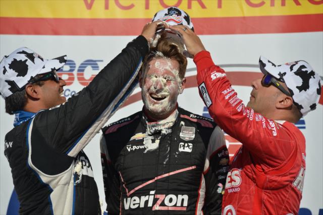 Will Power gets a cream puff to the head from Juan Pablo Montoya and Tony Kanaan in Victory Lane at the Milwaukee Mile -- Photo by: Chris Owens