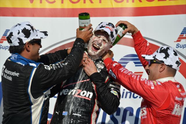 Will Power, Juan Pablo Montoya, and Tony Kanaan celebrate in Victory Circle after the ABC Supply Wisconsin 250 at the Milwaukee Mile -- Photo by: Chris Owens