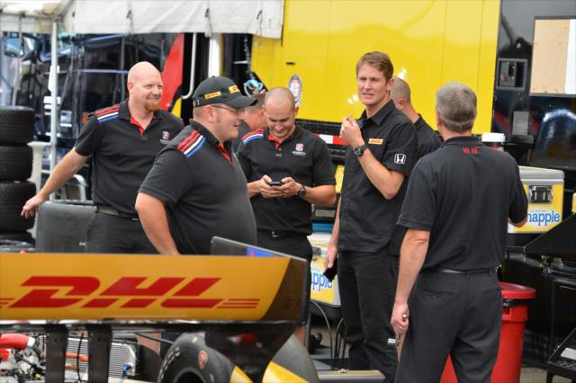 Ryan Hunter-Reay chats with his Andretti Autosport team in the Milwaukee paddock -- Photo by: Chris Owens