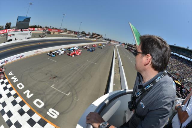 GoPro President Tony Bates shows the green flag to start the GoPro Grand Prix of Sonoma at Sonoma Raceway -- Photo by: Chris Owens