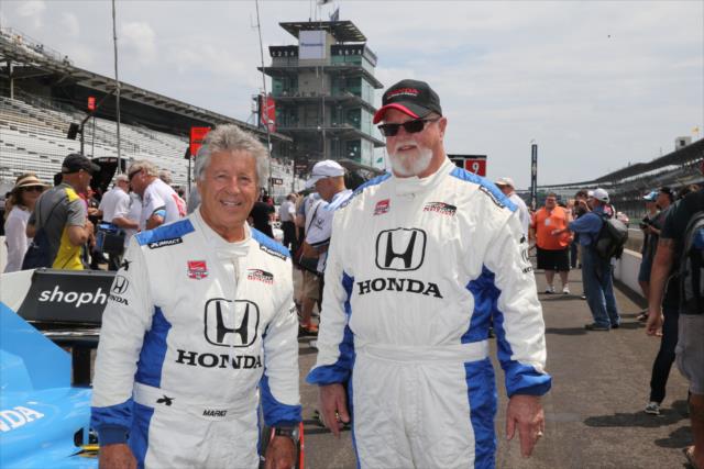 Mario Andretti with the ride-along winner for the Honda Fastest Seat in Sports -- Photo by: Chris Jones