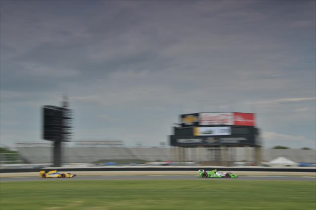 Sebastien Bourdais and Marco Andretti roll through Turn 4 during the Angie's List Grand Prix of Indianapolis at the Indianapolis Motor Speedway -- Photo by: Chris Owens