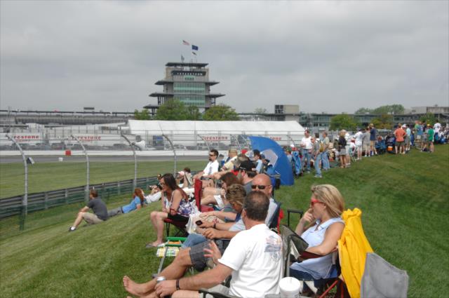 Fans observe on track action on the mounds at IMS -- Photo by: Dana Garrett