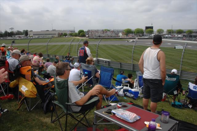 Fans observe on track action on the mounds at IMS -- Photo by: Dana Garrett