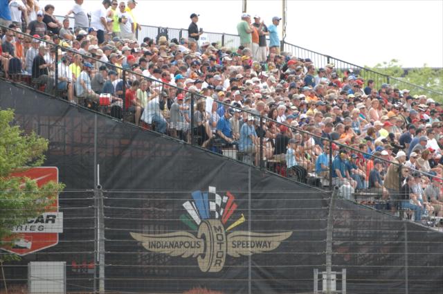 A great crowd watches the Turn 7 action at the Angie's List Grand Prix of Indianapolis -- Photo by: Dana Garrett