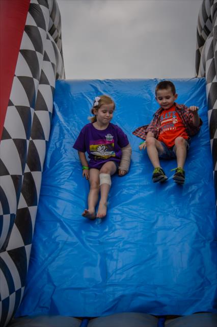 The inflatable slide is a fan favorite in the INDYCAR Fan Village at the Indianapolis Motor Speedway -- Photo by: Forrest Mellott